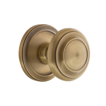 Grandeur Circulaire Door Knob with Circulaire Rose Vintage Brass