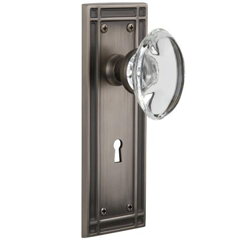 Nostalgic Warehouse Mission Backplate Privacy Mortise with Oval Crystal Knob