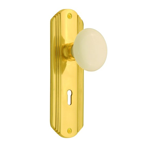 Nostalgic Warehouse Deco Backplate with White Porcelain knob PB Polished Brass