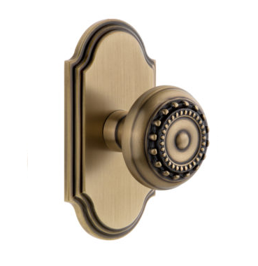 Grandeur Parthenon Door Knob Set with Arc Short Plate Vintage Brass