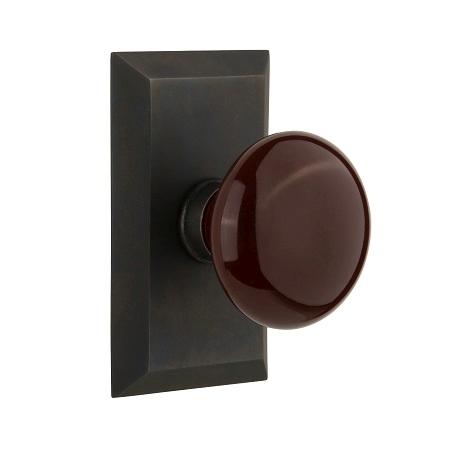 Nostalgic Warehouse Studio Plate with Brown Porcelain Knob Oil Rubbed Bronze