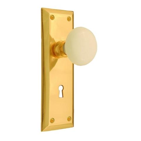 Nostalgic Warehouse New York Backplate with White Porcelain knob Polished Brass