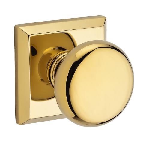 Baldwin Reserve Round Knob shown with Square Rose (TSR) in Polished Brass (003)