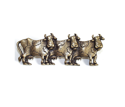 Emenee OR252 Cow Cabinet Pull facing Right shown in Antique Matte Brass (ABR)